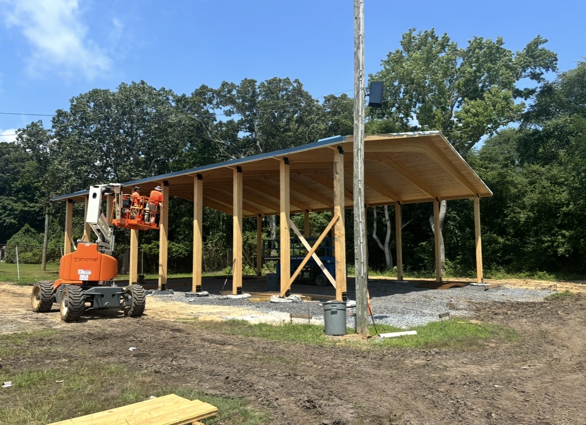 Pavilion with the metal roof and tongue-and-groove ceiling installed, viewed from outside